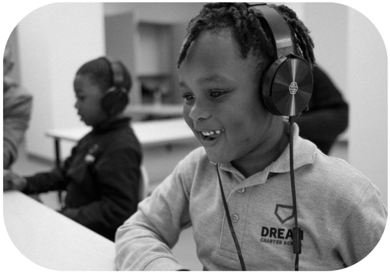 A photo of a smiling student using Bloom